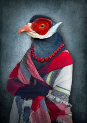 Bird wearing a colorful scarf and red beads against a dark background